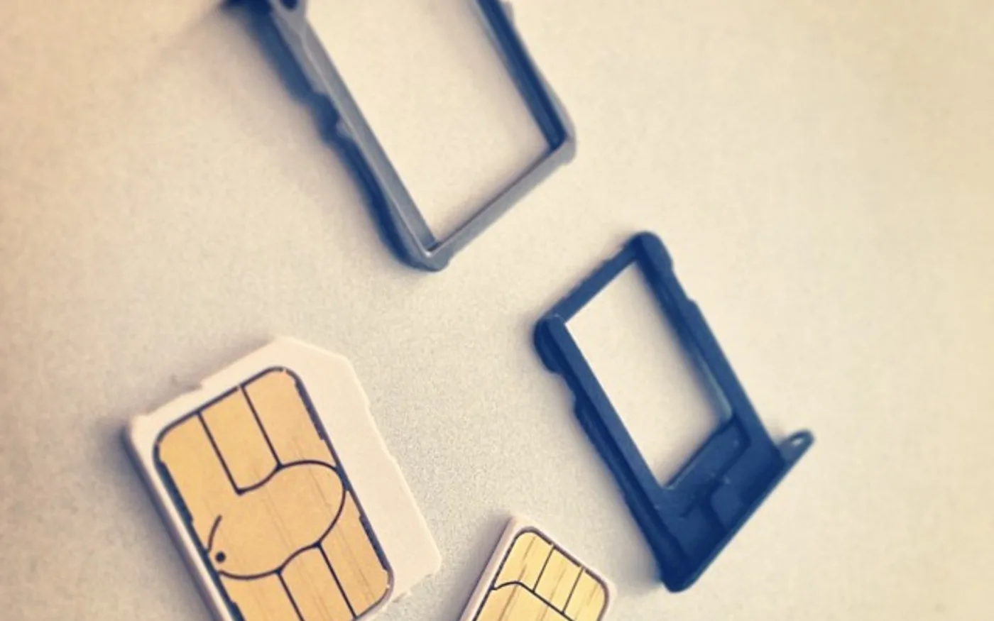 SIM cards and trays for mobile phones