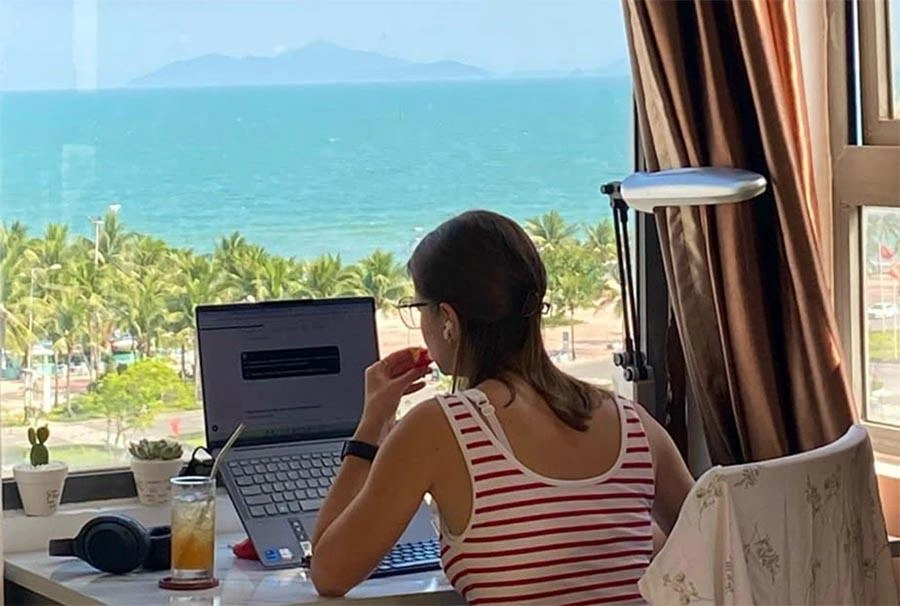 Remote worker in Vietnam with ocean view