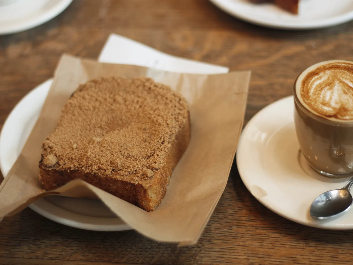 Coffee and cake on a cafe table